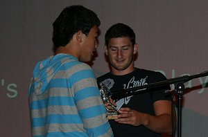 Hayden Fepuleai collects the Under 14 TSP award from Mitch Brown 