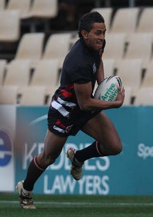 Kane Morgan flies up the wingin the Arrive alive Cup game vs Illawarra SHS