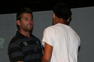 Reece Williams presents an award