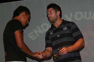 Reece Williams presents an award