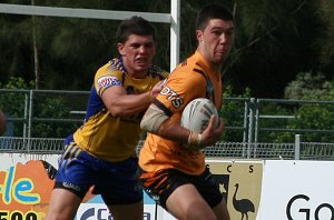 Curtis Sironen tries to get away from Parramatta's Jason Seage in rnd 8 of the SG Ball (Photo : ourfootymedia)