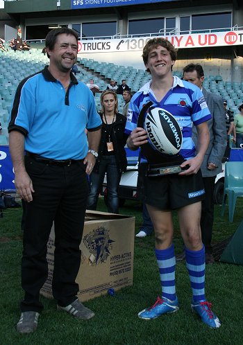 The COKE MAN presents the 2010 COCA COLA CUP to Jets Skipper Jaiden Brown At SFS (Photo's : Steve Montgomery / OurFootyTeam.com) 
