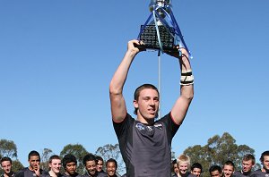 PENRITH PANTHERS Captain Bryce Cartwright holds up the 2010 Harold Matthew's Cup (Photo : ourfootymedia)