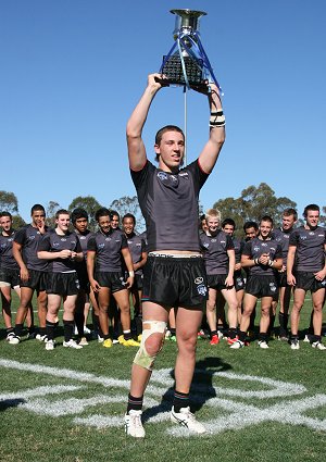 Panthers Captain Bryce Cartwright hold up the Harold Matthews Cup (Photo's : Steve Montgomery / OurFootyTeam.com)
