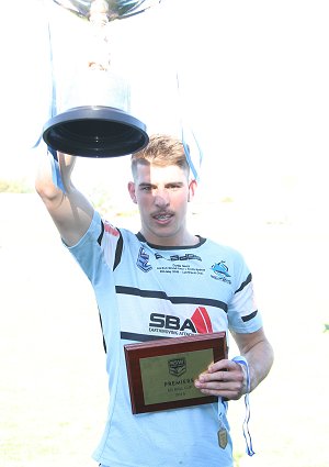 Cronulla Sharks SG Ball Captain Curtis Scott hold up the 2015 SG Ball Cup (Photo : steve montgomery / OurFootyTeam.com)
