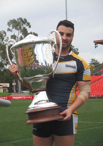 Matt Vidal Westfields SHS Catpain proudly holding the 2016 National GIO Schoolboy Cup (Photo : steve montgomery / OurFootyTeam.com)