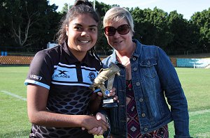 Akira Kelly is presented with her