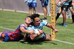 Jerome Heleta dives in for a fine try against the Knights in Rnd 4 ( Photo : Steve Montgomery / OurFootyTeam.com )