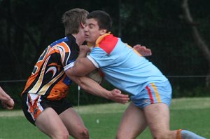 then gets hit - De la Salle vs Yarrawarra Tigers Rnd 10 (Photo : ourfooty media)