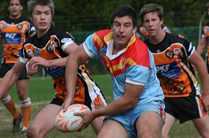 Dane Fazarkerley offloads - De la Salle vs Yarrawarra Tigers Rnd 10 (Photo : ourfooty media)