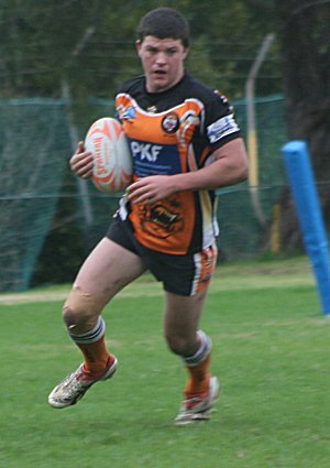 Chad Townsend runs under the posts - De la Salle vs Yarrawarra Tigers Rnd 10 (Photo : ourfooty media)