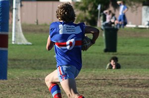 Brad Ring runs to score a good try against De la Salle (Photo : ourfooty media)