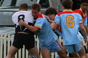 Sam puts on some good defence - De La Salle Vs Cronulla U 15A's (Photo : ourfooty media)
