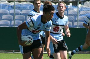 Zac Rasmussen runs the footy (photo : ourfooty media) 