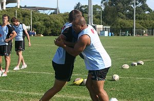Jimmy Dymock show the boyz how to tackle a bloke (Photo : ourfooty media)