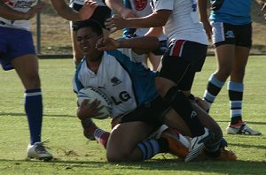 The 'e' man - Eronny Mareko hold the ball tight 