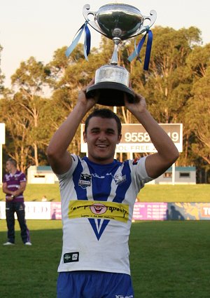 Liam Ayoub hold up the SG BAll Cup (Photo : ourfooty media)