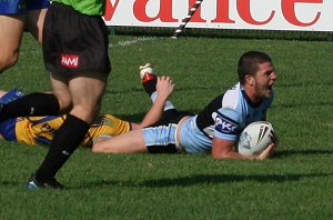 Chad Townsend runs up the middle thru the Eels and dives over for a good try (Photo : ourfooty media)