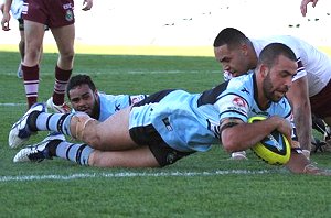 Anthony Moraitis dives over for the Sharks 1st try after a slick pass from Jaden Clarke (Photo : steve monty / OurFootyTeam.com) 