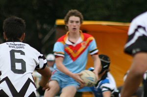 Tommy McLennan runs the ball 
