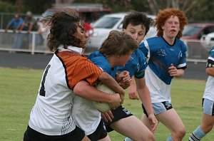 Jack Sommerfield barges his way to the try line... 