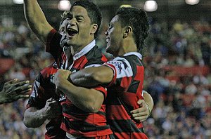 Isaac Luke celebrates with his team mates