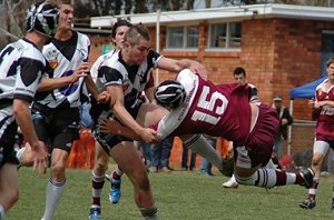 Joel Jackson lifts the Inverell player off the ground in the U/18s. Glen’s Under 18s victory
