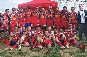 The Singleton Under 16s proudly show off their winning medals