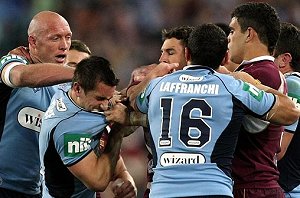 Mitchel Pearce trying to stay out of it during the ' 08 SOO 3 clash