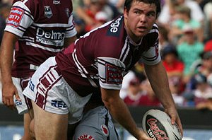 Jamie Lyon looks to offload during the Sea Eagles's tight win over the Warriors.