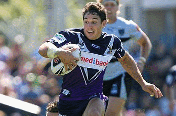 Fall guy: New Zealand Warrior Wade McKinnon feels the weight of the Melbourne Storm defence, led by Matt King, at Olympic Park. Picture: George Salpigtidis Read story now