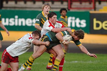 Will Matthews tackled by the England defence in the 1st test Dec 2006 - (photo : ourfooty media - dave williams)
