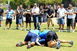 NRL referees look at different types of tackles during thier pre-season meeting yesterday. Photograph: Mark Evans