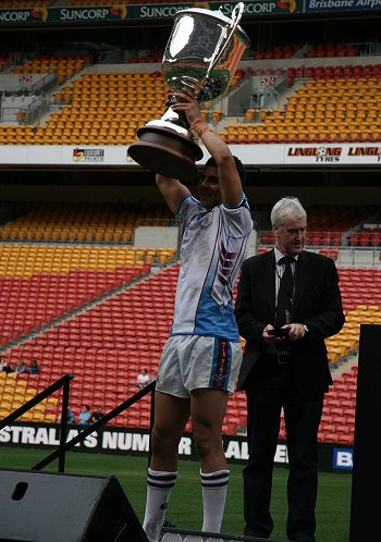 Jason Wehbe hold up the 2010 ARL Schoolboys Cup (Photo's : Steve Montgomery / OurFootyTeam.com) 