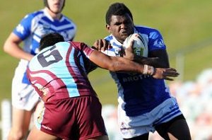 Brandon Pryor tries to fend off a tackler Photo: ZAK SIMMONDS