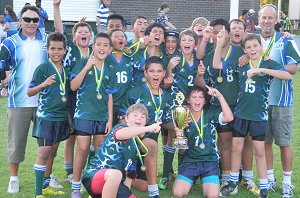 Morton Bay Public School celebrate winning the ARL Development Shield in Rockhampton