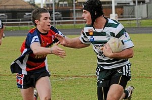 Charly Runciman makes a break for CYMS first grade against Cobar during the Group 11 season.