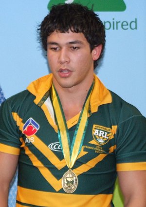 Dylan Cartwright proudly shows off his Col Matthews Medal