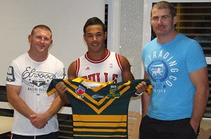 Christian Hazard receiving his game jersey from the tour coaches Brad Drew & Andrew Ryan. 