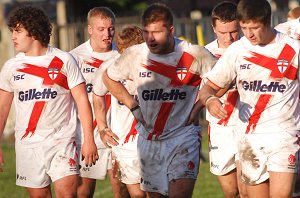 The England Lions u18's walk onto the footy ground