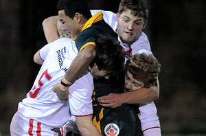 Christian Hazard gets wrapped up by 3 Lions (Photo's : dave williams RLphotos.com)