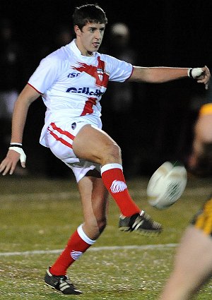 England Lion Karl Dixon kicks to ease some pressure against the AIS 