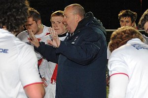 English Lions coach Kevin Lockett talk to his boyz against the AIS 