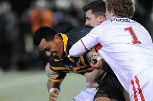 Lorenzo Vogel gets caught by Lions fullback Lewis Sheridan (Photo's : dave williams RLphotos.com)