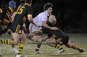 Scott Pink gets tackled against the AIS