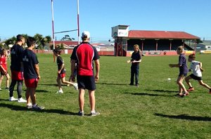 AIS hold a footy clinic at the local Greymouth Primary School (Photo : M Meredith / AIS)