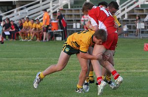 AIS Max Elliot smashes the South Coast Lock in a crunching tackle (Photo : Bill Phillips / DiGiSPORT / OurFootyMedia)