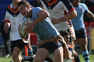 Gerard McMallum is tackled by CIS - ASSRL Championship Play Off NSWCHS v NSWCIS aCTion (Photo's : ourfootymedia)