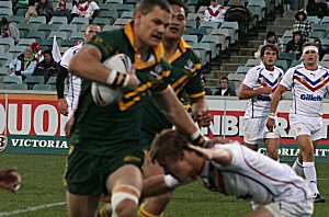 Cheyse Blair (Matraville SHS) palms the defender - Australian Schoolboys v GBC YOUNG LIONS 1st Test ACTION (Photo's : ourfootymedia)