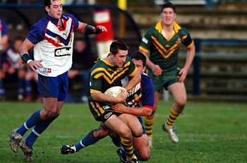 Mitchell Pearce get tackled during the ASSRL Vs GB Community Lions game